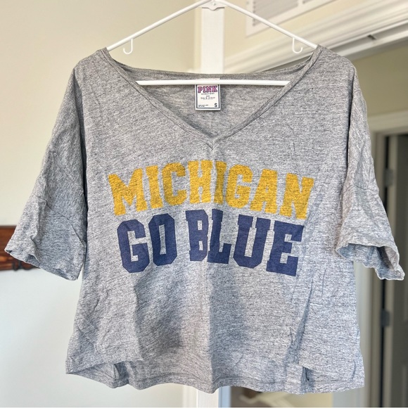 PINK Victoria's Secret Tops - University of Michigan Wolverines women’s cropped tee by Victoria’s Secret Pink.